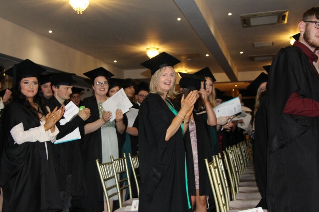 Graduates of Mayo College of FET acknowledging the Academic Staff